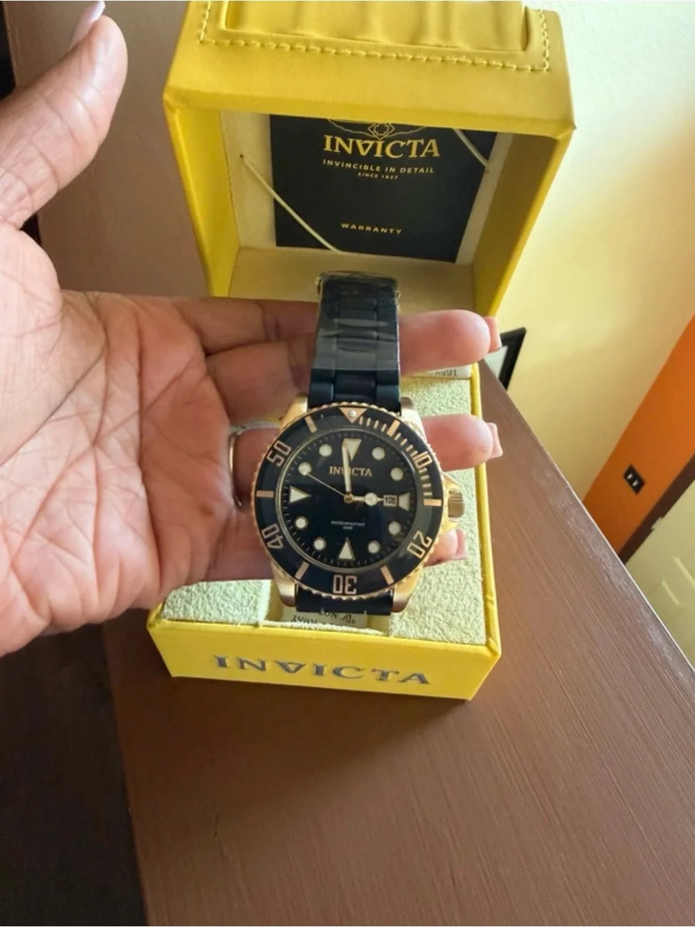 Invicta Black and Gold Men's Dive Watch with Black Strap
